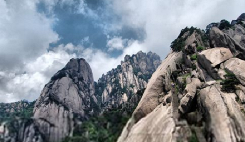 横看成岭侧成峰，远近高低各不同一诗写的是哪座山